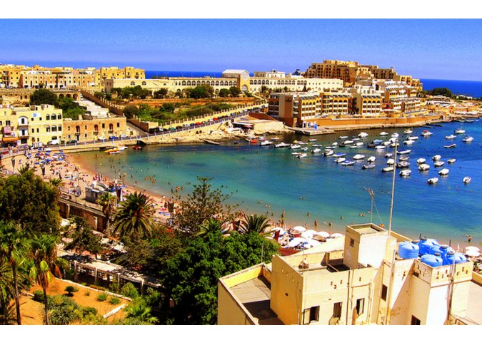 St Georges Bay in St Julian's malta, About Holiday Accommodation  Rentals in Malta & Gozo malta, Holiday Rentals Malta & Gozo malta